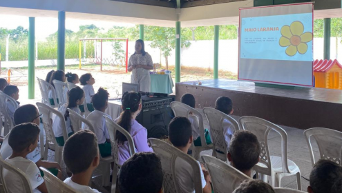 Ação realizada por empresa durante o Maio Laranja